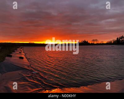 UK Weather: Sunset over Godalming. Tuesley Farm, Godalming. 20th February 2018. Dramatic skies over the Home Counties this evening. Sunset over Godalming in Surrey. Credit: jamesjagger/StockimoNews/Alamy Live News Stock Photo