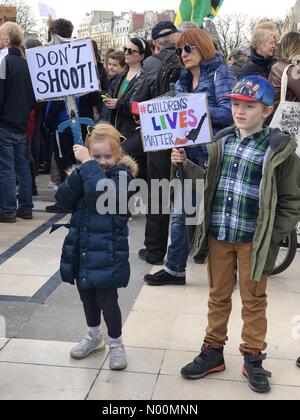 Paris, France. 24th Mar, 2018. Paris, 24th March'18, hundreds protested in front of Eiffel Tower in solidarity with protesters at Washington DC and the world demanding tougher guns law Credit: Hawwa Qusimy/StockimoNews/Alamy Live News Stock Photo