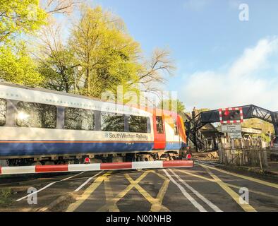 Milford, Surrey, UK. Station Lane, Milford. 25th April 2018. Continued engineering works at Wimbledon caused disruption to rail services this morning in Milford Credit: jamesjagger/StockimoNews/Alamy Live News