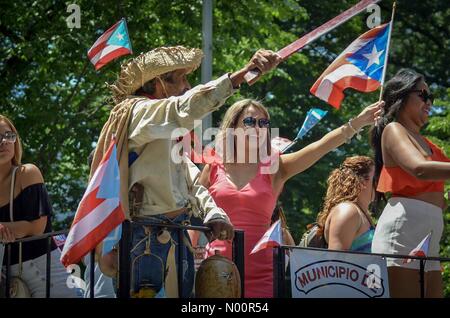 New York, USA. 9th June 2018. Spectators along Fifth ave in New York City during the 2017 Puerto Rican Day parade Credit: Ryan Rahman/StockimoNews/Alamy Live News Stock Photo