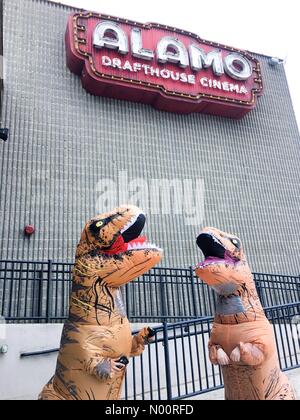 Yonkers, New York, USA. 23rd June, 2018. Yonkers NY - 23 July 2018: Dinosaurs outside the Alamo Drafthouse Cinema for the opening weekend of Jurassic World: Fallen Kingdom. Credit: Marianne A. Campolongo/StockimoNews/Alamy Live News Stock Photo