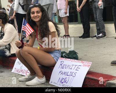 Santa Barbara, California, USA. 30th June, 2018. 6/30/2018 Santa Barbara, CA. Local citizens unite in protest against president Trump and his current administration on the issue of immigration and the separation of children from their parents. Credit: Eyal Nahmias/StockimoNews/Alamy Live News