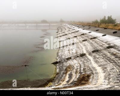 UK Weather: Misty in Godalming. Tuesley Farm, Godalming. 05th July 2018. A misty start to the day for the Home Counties. Misty weather over Tuesley Farm in Godalming where reservoir levels are low. Credit: jamesjagger/StockimoNews/Alamy Live News Stock Photo