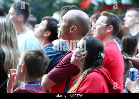 Camden, London, UK. 11th July 2018. Eng v Croatia screening, Russell Square, Camden, London. Football fans take in England's semi-final World Cup match against Croatia at a public screening in Russell Square. Credit: Ollie Cole/StockimoNews/Alamy Live News Stock Photo