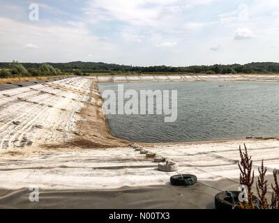 UK Weather: Water shortages in Godalming. Tuesley Lane, Godalming. 24th July 2018. Heatwave conditions in the south east today. Water levels at dangerously low levels in Godalming, Surrey. Credit: jamesjagger/StockimoNews/Alamy Live News Stock Photo