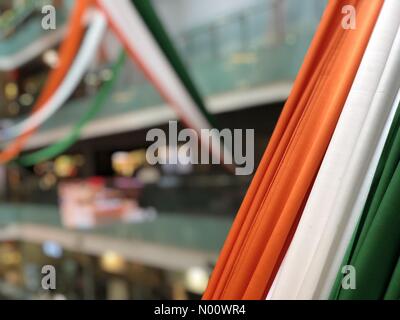 12th August 2018. Ambience Mall, New Delhi. India. Large Indian tricolour flags hand across a big shopping mall in preparation for the Independence day on the 15th of August. Credit: atracurium /StockimoNews/Alamy Live News Stock Photo
