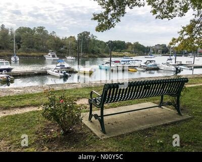 Mamaroneck, New York, USA. 22nd October, 2018. USA WEATHER 22 Oct 2018-Harbor Point Park, Mamaroneck, NY: Boats in the harbour as clouds give way to sun but temperatures stay cool in the high 40s F. Stockimo Live News/Marianne Campolongo Credit: Marianne A. Campolongo/StockimoNews/Alamy Live News Stock Photo