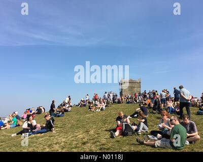 Chorley, Lancashire, UK. 19th April, 2019. UK Weather: Sunny and warm in Chorley. A lovely sunny day for the traditional Good Friday walk up Rivington Pike in Chorley, Lancashire. Credit: Lancashire Images/StockimoNews/Alamy Live News Stock Photo