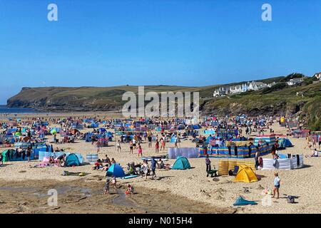 UK Weather: Crowded Polzeath beach despite Covid warnings at the start of the bank holiday weekend in Cornwall, UK. 27th August, 2021. Credit nidpor/Alamy Live News Credit: nidpor/StockimoNews/Alamy Live News Stock Photo