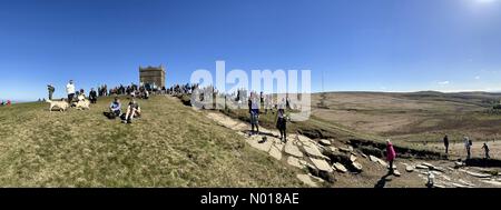 UK Weather: Sunny at Rivington. A sunny morning with clear blue sky for the traditional Good Friday climb up Rivington Pike near Chorley in Lancashire. Stock Photo