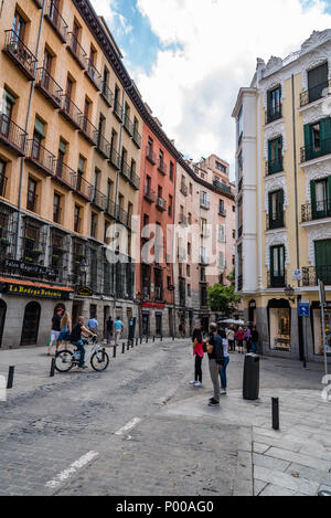 Madrid, Spain - June 2, 2018: Tourists in Cuchilleros Street near Plaza Mayor in city centre of Madrid Stock Photo