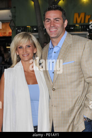 File:US Navy 050212-N-6504N-002 New York Giants quarterback Kurt Warner,  and his wife