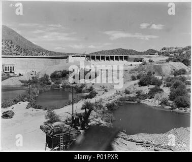 Stewart Mountain Dam. View from downstream side of dam showing completed spillway channel. - Stock Photo