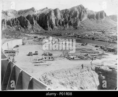 Stewart Mountain Dam. View looking downstream, new spillway channel. Left counterfort wall in lower left corner. - Stock Photo