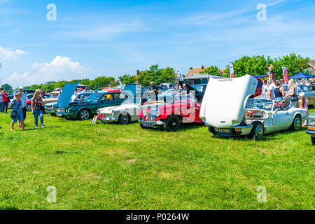 RAMSGATE, KENT, UK - JUNE 03, 2018: People enjoy sunny day at the annual Ramsgate Bucket and Spade Classic Car Rally Stock Photo