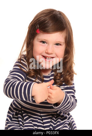 toddler girl with thumbs up Stock Photo