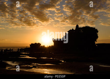 Silhouette of Tanah Lot at sunset time, Bali, Indonesia Stock Photo