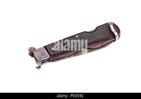 Closed rusty old folding knife on a white background Stock Photo