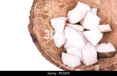 In the shell of coconut pulp is sliced nut closeup Stock Photo