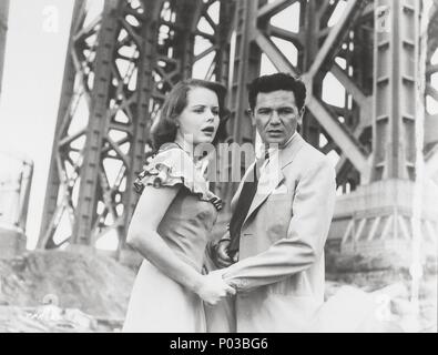 Original Film Title: FORCE OF EVIL.  English Title: THE STORY OF TUCKER'S PEOPLE.  Film Director: ABRAHAM POLONSKY.  Year: 1948.  Stars: JOHN GARFIELD; BEATRICE PEARSON. Credit: M.G.M / Album Stock Photo