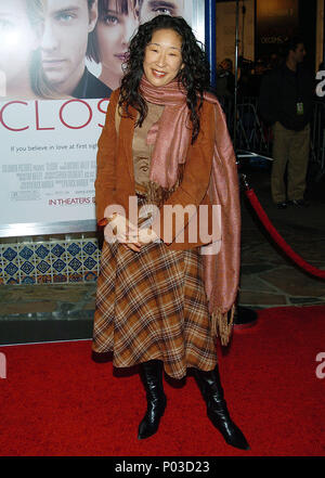 Sandra Oh arriving at the Closer Premiere at the Westwood Village Theatre  in Los Angeles. November 22, 2004.11-OhSandra018 Red Carpet Event, Vertical, USA, Film Industry, Celebrities,  Photography, Bestof, Arts Culture and Entertainment, Topix Celebrities fashion /  Vertical, Best of, Event in Hollywood Life - California,  Red Carpet and backstage, USA, Film Industry, Celebrities,  movie celebrities, TV celebrities, Music celebrities, Photography, Bestof, Arts Culture and Entertainment,  Topix, vertical, one person,, from the year , 2004, inquiry tsuni@Gamma-USA.com Fashion - Full Length Stock Photo