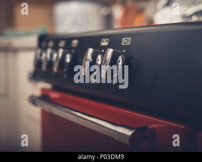 Close up on the dials of a gas cooker stove Stock Photo