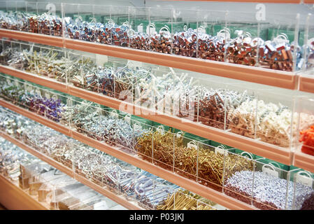 Screws, bolts, dowels and fasteners in the store Stock Photo