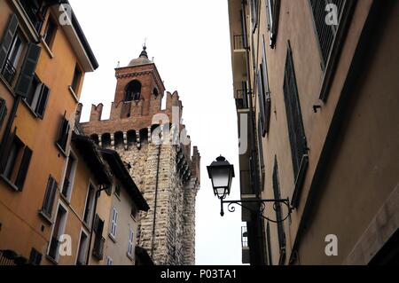 City view with medieval tower 'La Pallata' (untranslatable), built in the year 1254. Brescia, Italy. Stock Photo