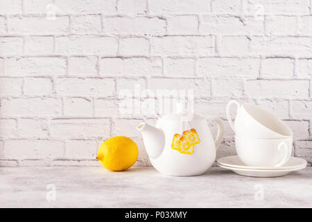 Two cups and teapot for morning tea. Copy space. Stock Photo