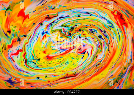Colorful abstract acrylic painting. Natural dynamic mixture of oil colored pigments fluid flow background. Naturally blurred. Stock Photo