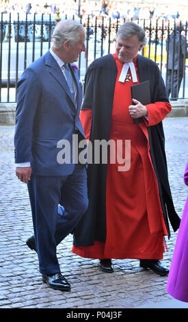 The Prince of Wales (left), with his former private secretary Stephen Lamport, arrives at Westminster Abbey to open the Queen's Diamond Jubilee Galleries. Stock Photo