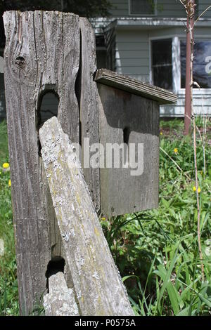 Bird House on Fence Stock Photo