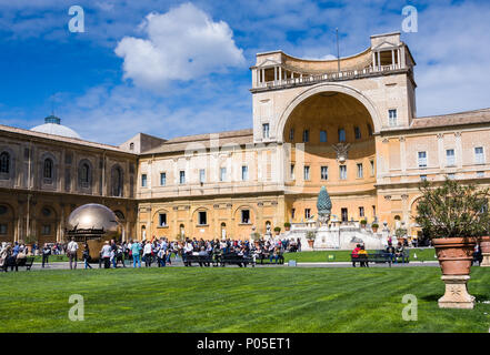 Tourists at the Fontana Della Pigna or famous Pine cone at Vatican City in Rome Stock Photo