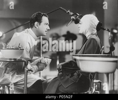 Original Film Title: A WOMAN'S FACE.  English Title: A WOMAN'S FACE.  Film Director: GEORGE CUKOR.  Year: 1941.  Stars: MELVYN DOUGLAS; JOAN CRAWFORD. Credit: M.G.M. / Album Stock Photo