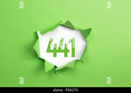 Green Number 441 on green paper background Stock Photo