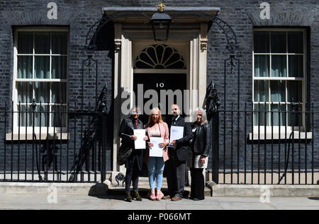 (left to right) Actress Frances Barber, Yvette Greenway, Andreas Ioannidis and Joanne Welch outside 10 Downing Street in London where they delivered a letter of intent for the #BackTo60 campaign. Stock Photo