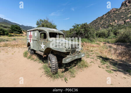 Malibu, California, USA - May 29, 2018:  Vintage 'MASH' ambulance panel truck picture vehicle prop on display at Malibu Creek State Park. Stock Photo