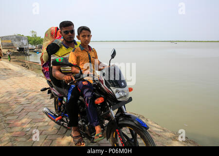 Motorbike is the only public transport of Gabura, a small island beside the Sundarbans. Satkhira, Bangladesh. Stock Photo