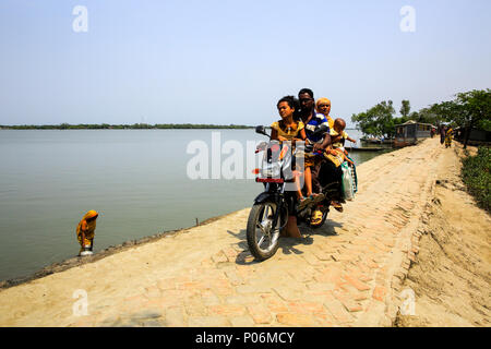 Motorbike is the only public transport of Gabura, a small island beside the Sundarbans. Satkhira, Bangladesh. Stock Photo