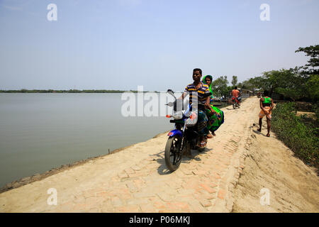 Motorbike is the only public transport of Gabura, a small island beside the Sundarbans. Satkhira, Bangladesh. Stock Photo