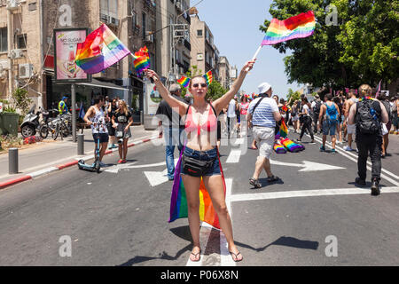 Tel Aviv, Israel. 8th Jun, 2018. Under the blazing sun, 250000 people attended Tel Aviv's 20th annual Gay Pride Parade. The event is largest of it's kind in the Middle East, and Tens of thousands of international tourists joined in the festivities, flying into Israel especially to take part in the parade. Credit: galit seligmann/Alamy Live News Stock Photo