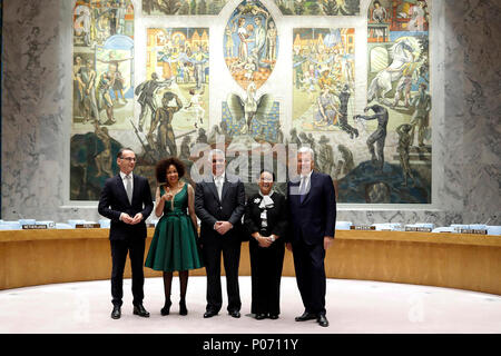 (180608) -- UNITED NATIONS, June 8, 2018 (Xinhua) -- German Minister of Foreign Affairs Heiko Maas, South African Minister of International Relations and Cooperation Lindiwe Sisulu, Dominican Foreign Minister Miguel Vargas, Indonesian Foreign Minister Retno Marsudi and Belgian Foreign Minister Didier Reynders (from L to R) pose for a photo in the United Nations Security Council chamber at the UN headquarters in New York, June 8, 2018. The UN General Assembly on Friday elected South Africa, Indonesia, the Dominican Republic, Belgium and Germany to serve during 2019-2020 in the UN Security Counc Stock Photo