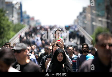 Tehran, Iran. 8th June, 2018. People attend a rally to mark the Quds (Jerusalem) Day in downtown Tehran, Iran, on June 8, 2018. Hundreds of thousands of Iranians held massive rallies nationwide on Friday to mark the Quds (Jerusalem) Day to support the Palestinians, while denouncing the policies of Israel and the United States. Credit: Ahmad Halabisaz/Xinhua/Alamy Live News Stock Photo