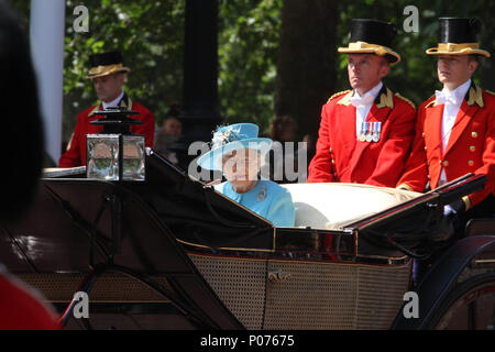 London, UK 9 June 2018: HMR Queen Elizabeth seen on horse-drawn carriage as they make their way to the Horse Guards Parade Ground on 9 June 2018. Over 1400 parading soldiers, 200 horses and 400 musicians come together each June in a great display of military precision, horsemanship and fanfare to mark The Queen's official birthday. Credit: David Mbiyu Stock Photo