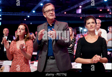 09 June 2018, Germany, Leipzig: Janine Wissler (l-r), faction leader of The Left party in the Hessian Landtag, Dietmar Bartsch and faction leader of the The Left party in the German Bundestag, Sahra Wagenknecht, attend the national party conference of The Left party. Photo: Britta Pedersen/dpa Stock Photo