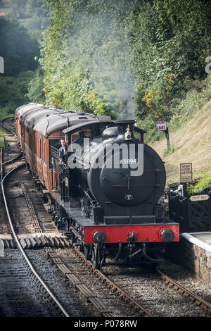 J27 Locomotive 65894 (NER P3 2392) approaching Goathland station on ...