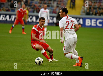 Moscow, Russia - June 5, 2018. Russian midfielder Alan Dzagoev against Turkish centreback Kaan Ayhan during international friendly against Russia at V Stock Photo