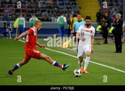 Moscow, Russia - June 5, 2018. Russian defender Igor Smolnikov against Turkish wingback Hasan Ali Kaldirimduring international friendly against Russia Stock Photo