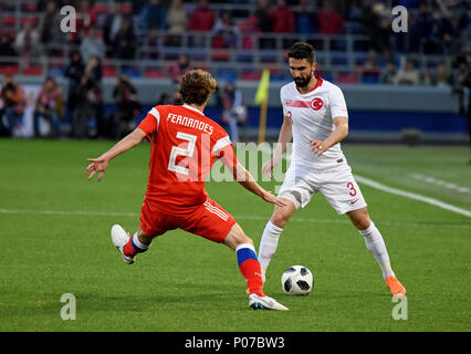 Moscow, Russia - June 5, 2018. Turkish wingback Hasan Ali Kaldirim and Russian defender Mario Fernandes during international friendly against Russia a Stock Photo