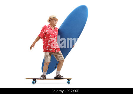 Full length profile shot of an elderly tourist holding a surfboard and riding a longboard isolated on white background Stock Photo